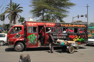 Unusual painted red city bus in Nairobi